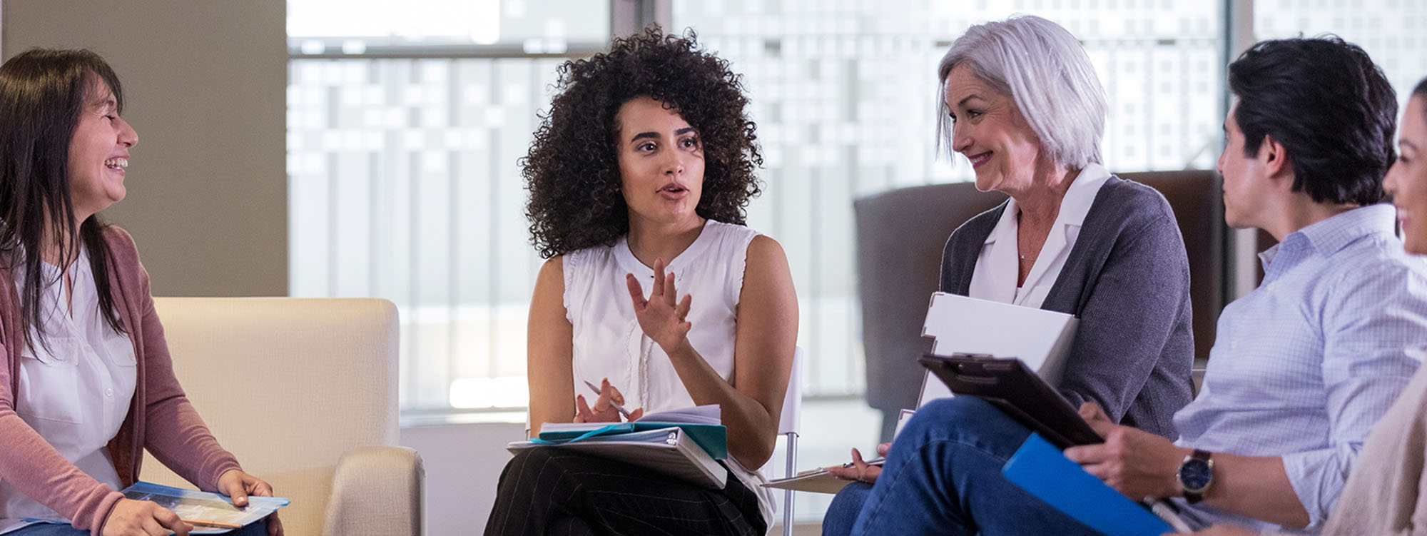 Attentive woman during group counseling session